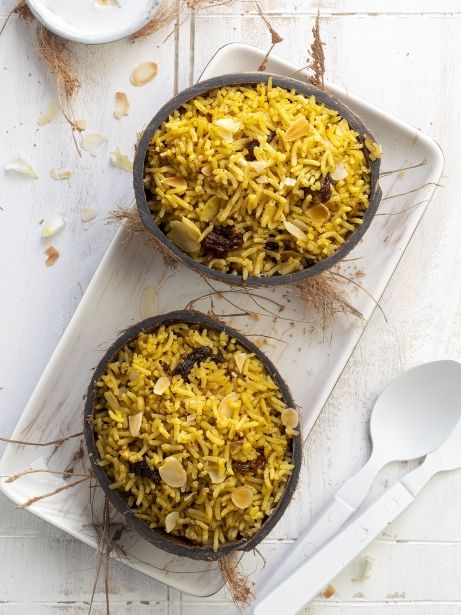 Arroz de coco 'titoté' con especies, pasas y almendras