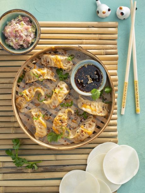 'Dumplings' de butifarra y col