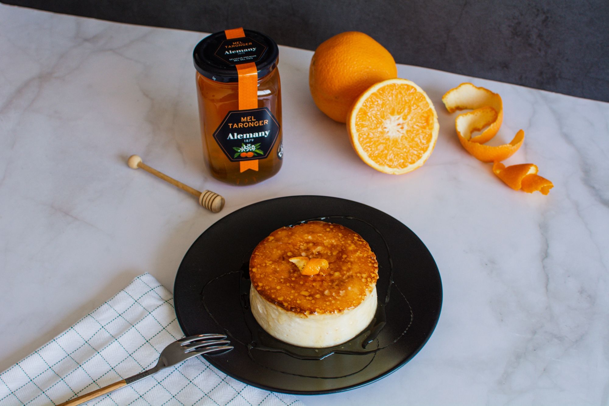 Pastís de formatge amb mel de taronger Alemany