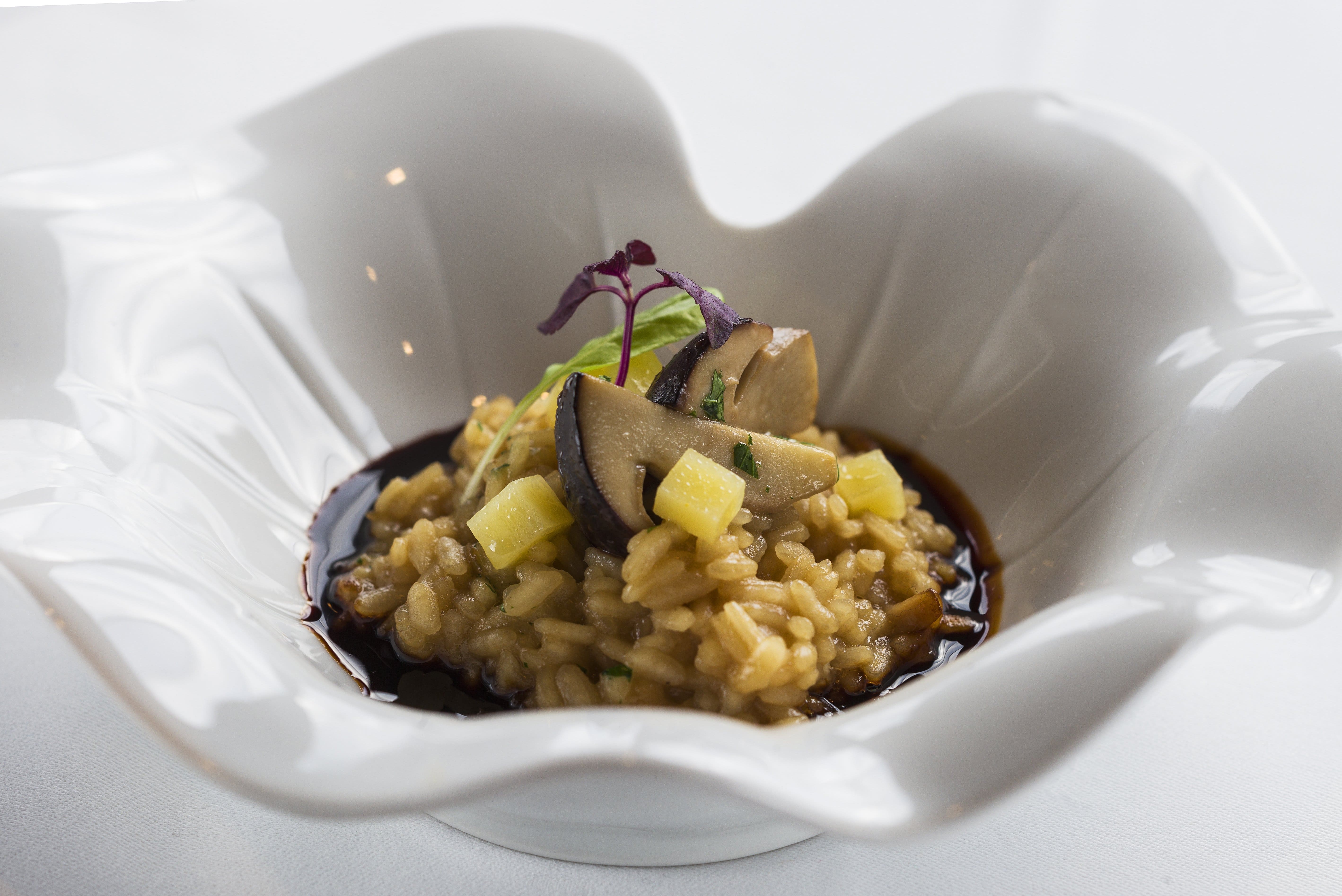 Risotto de ceps i sbrinz i salsa de porto