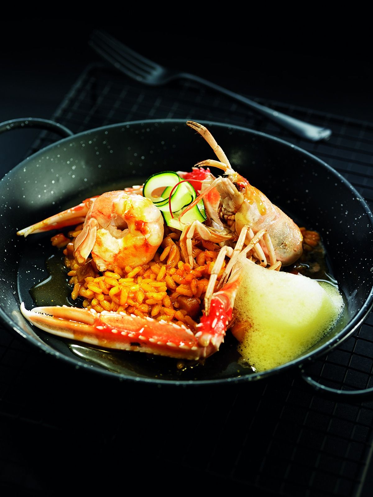 Risotto de sípia, escamarlà i carbassó al safrà