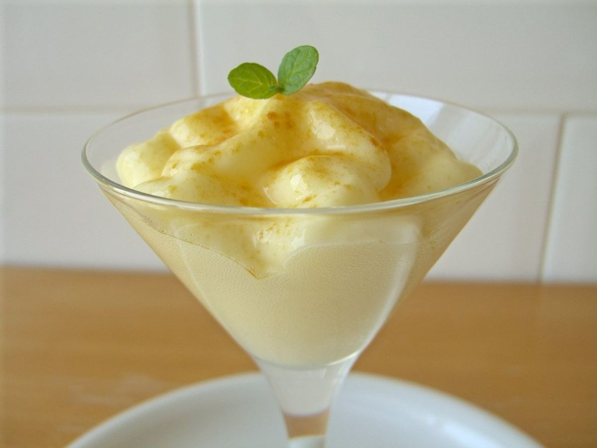 Escuma de natilles amb taronja i cardamom verd