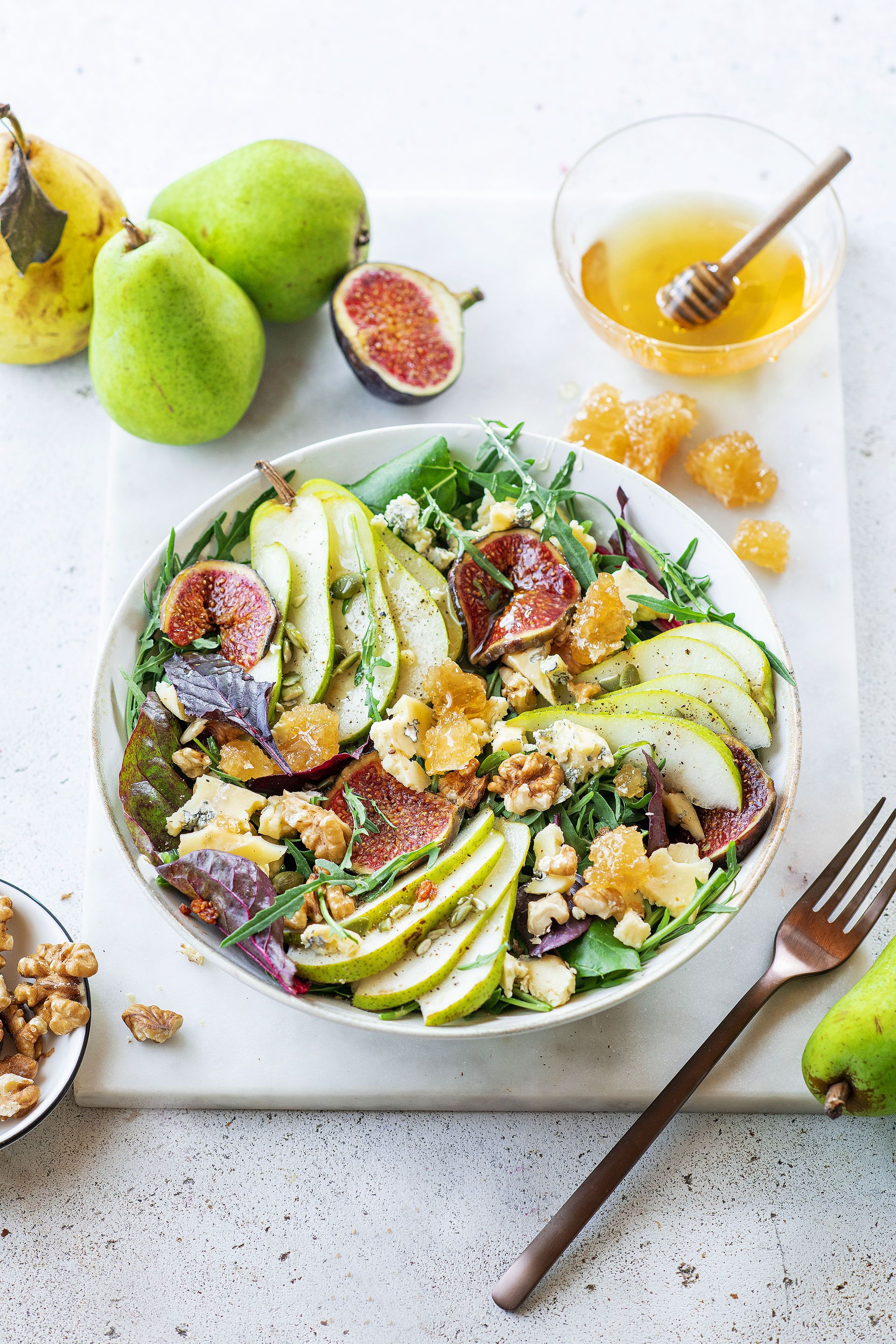 StockFood 13744414 HiRes Autumnal pear salad with figs r