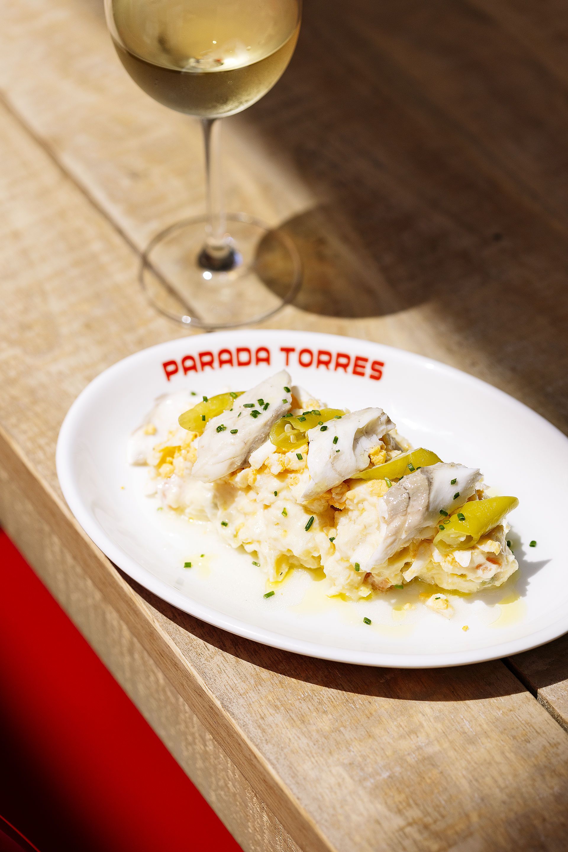 Ensaladilla de llobarro escabetxat