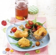 Bacallà con miel, espinacas y piñones