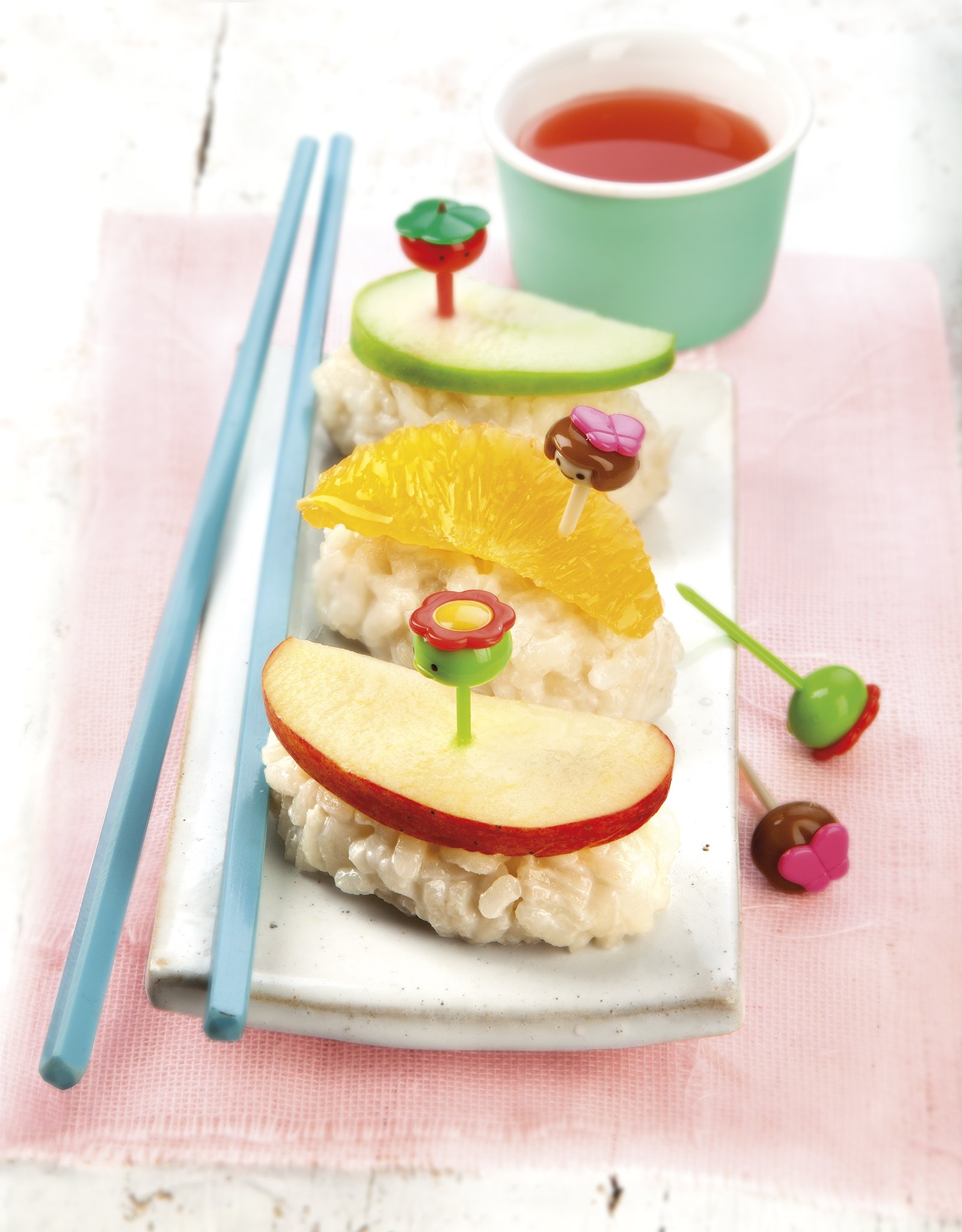 Sushi d'arròs amb llet, taronja i poma