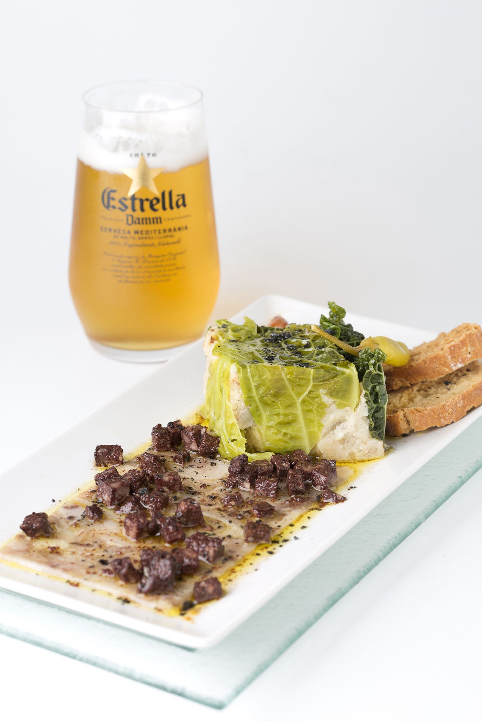 Trinchado de Prades con carpaccio de pies de cerdo con morcilla negra (IGP Patata de Prades)