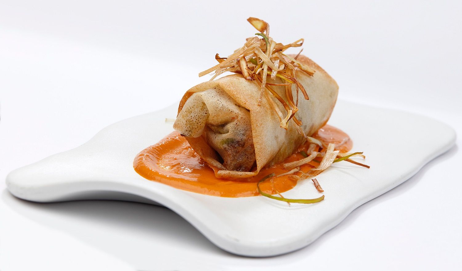 Caneló de verduras con salsa de pimientos del piquillo