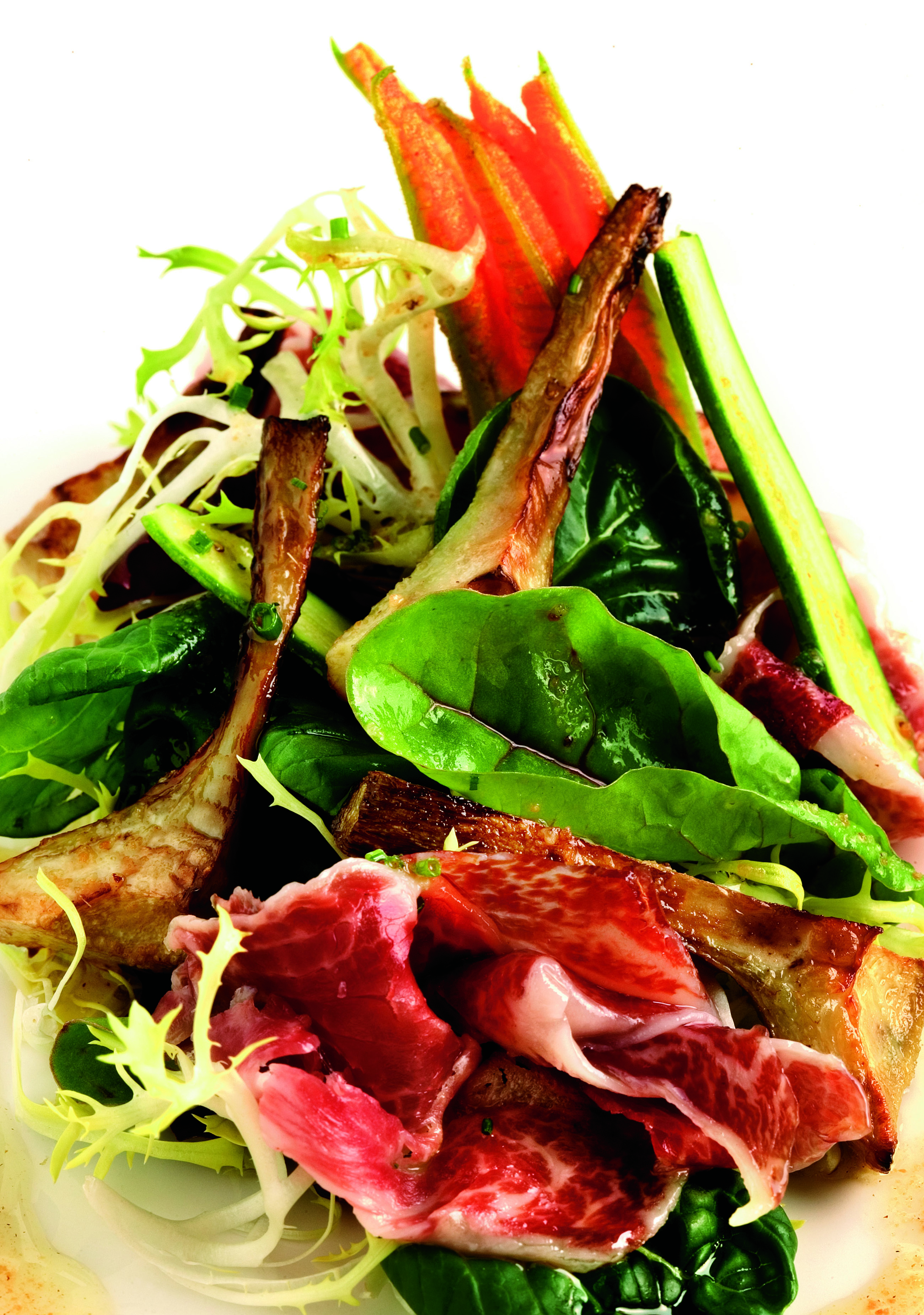 Amanida de carxofes amb pernil de gla i vinagreta de carquinyolis