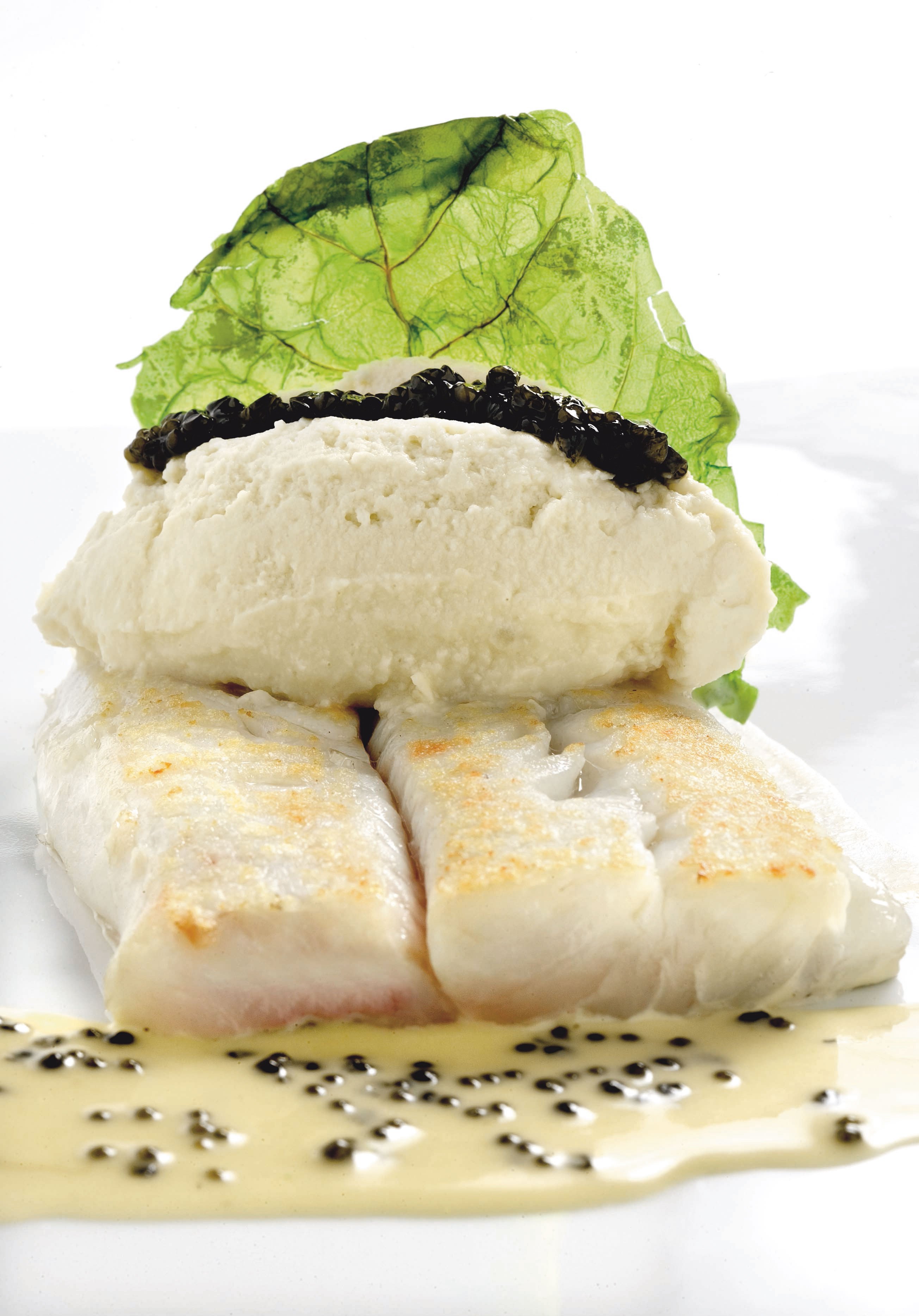 Merluza con fondant de brécol y caviar del valle de Aran