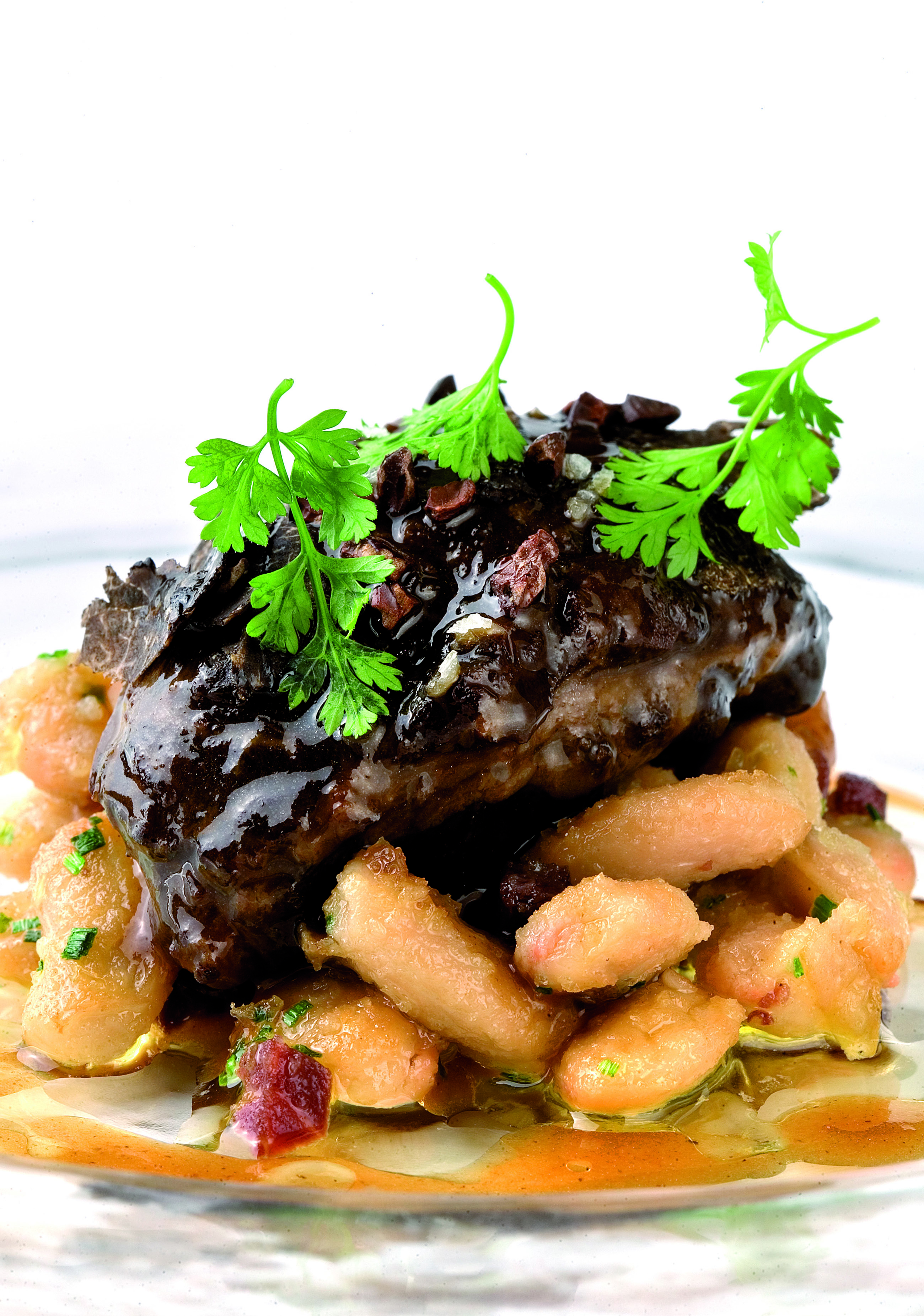 Galtes de porc estofades amb mongetes del ganxet