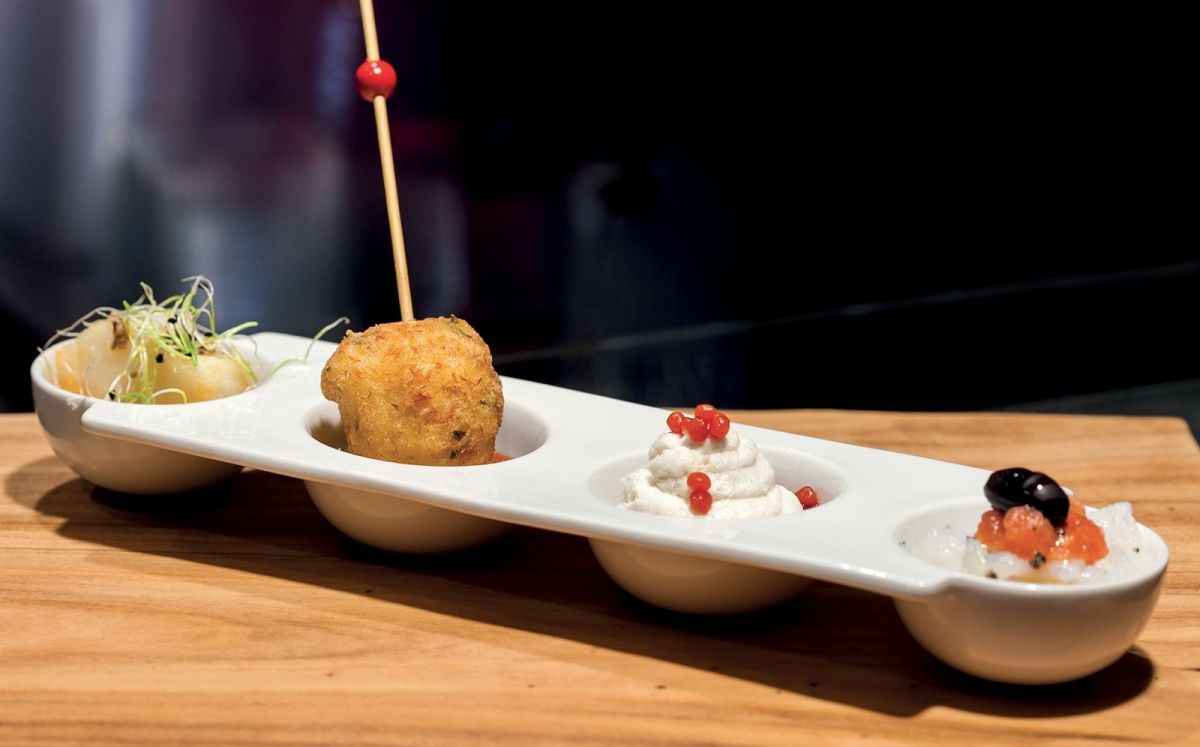 Tapa de bacalao confitado con salsa 'romesco'