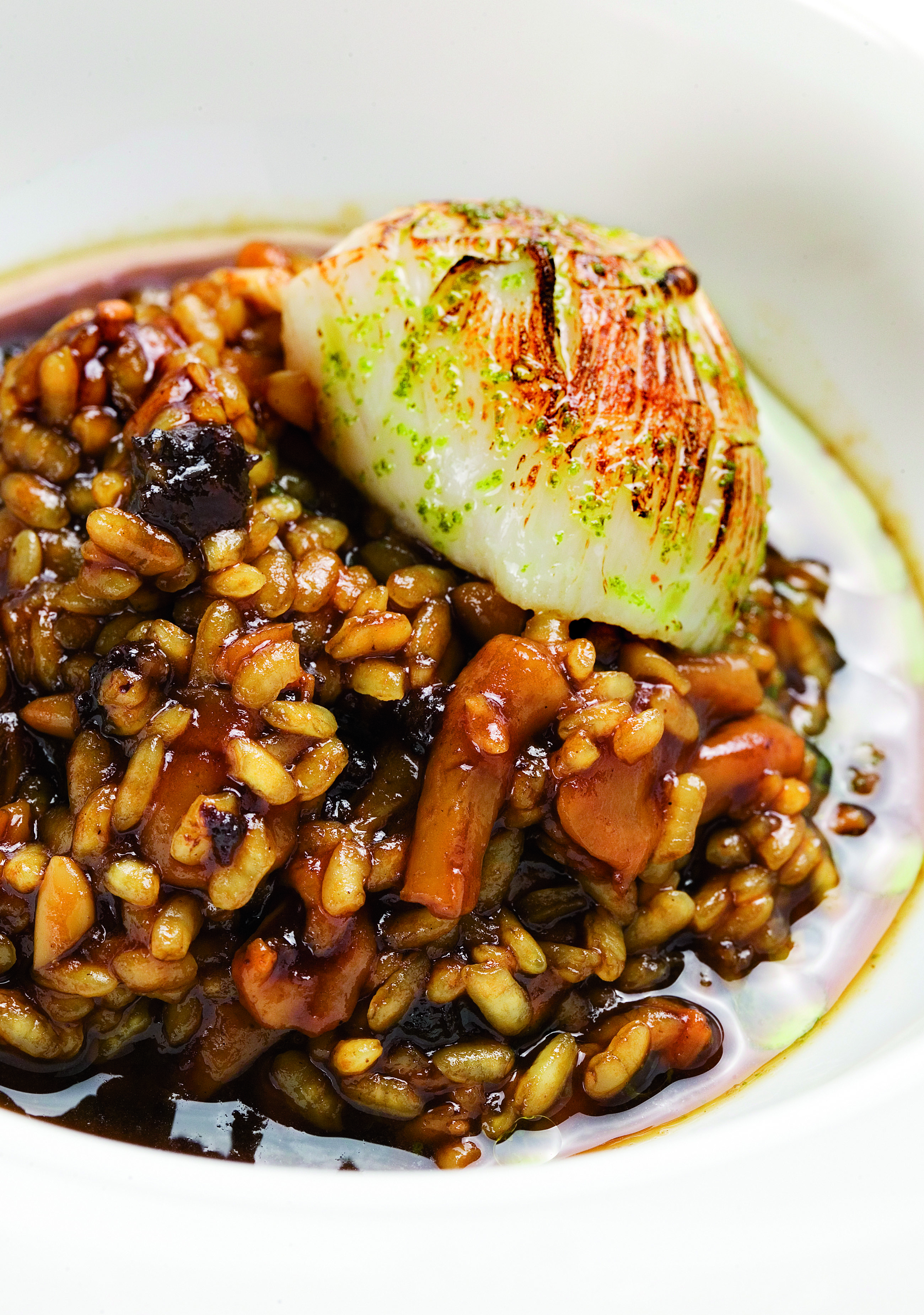 Arròs de tripa de bacallà amb vieira